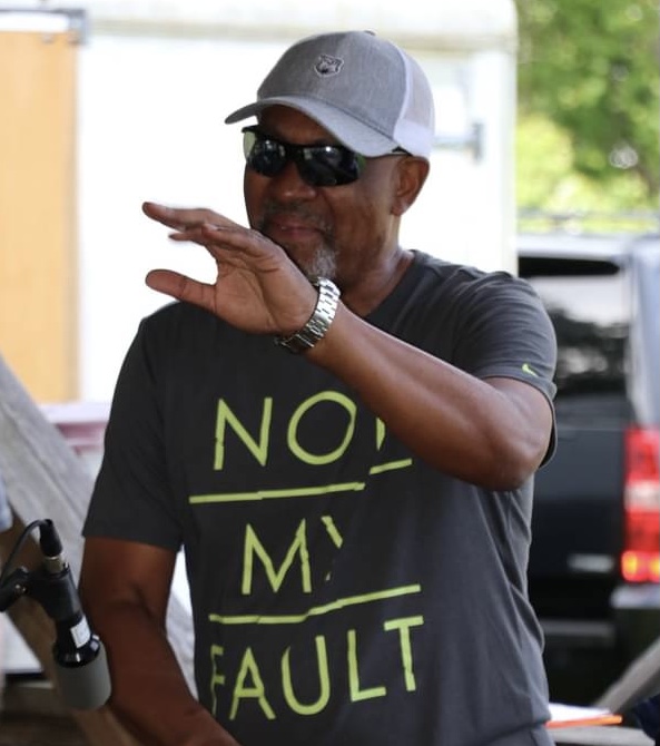 Andre coaching on the tennis court